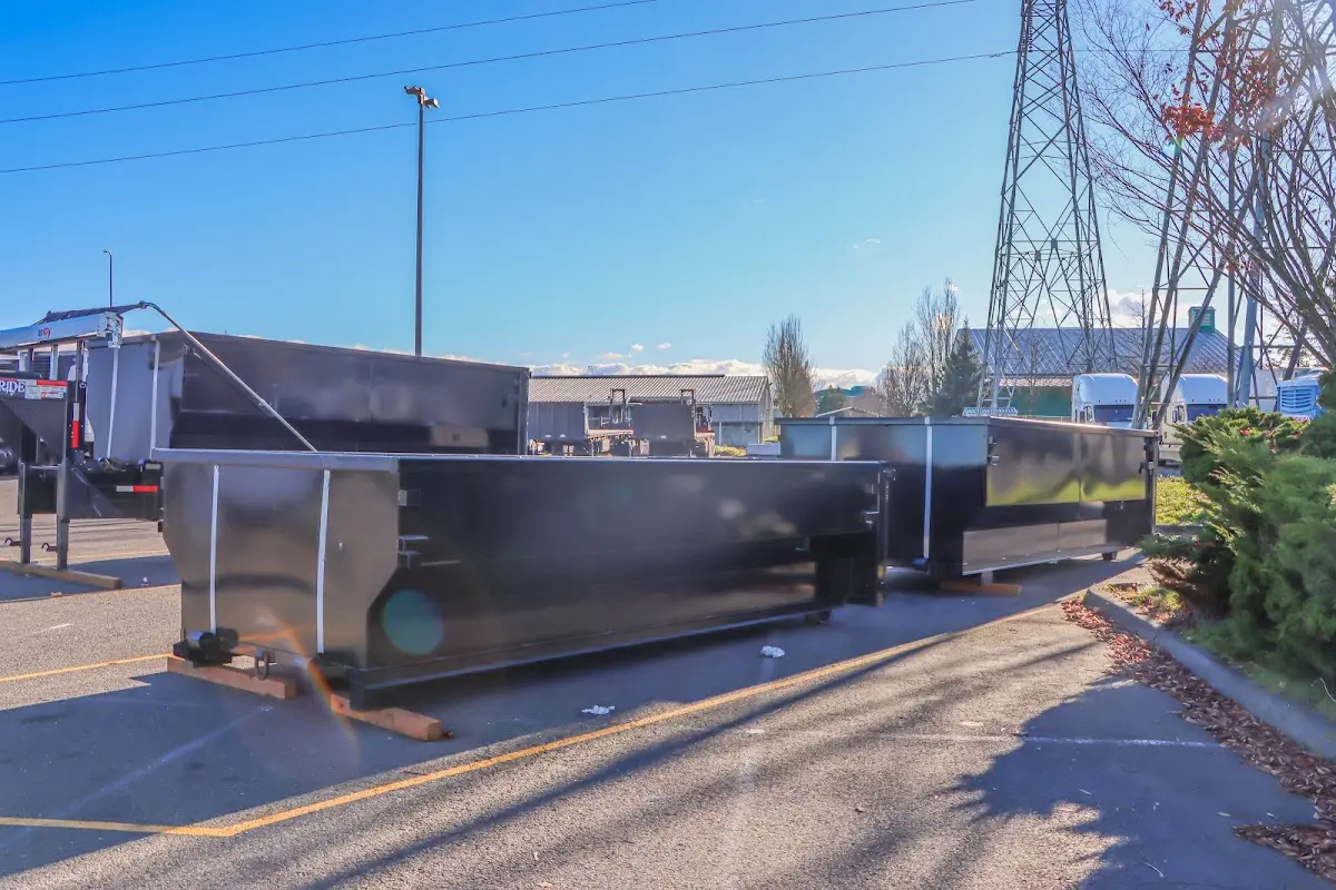 Roll-off dumpster ready for waste disposal at job site for Commercial Dumpster Rental in Auburn